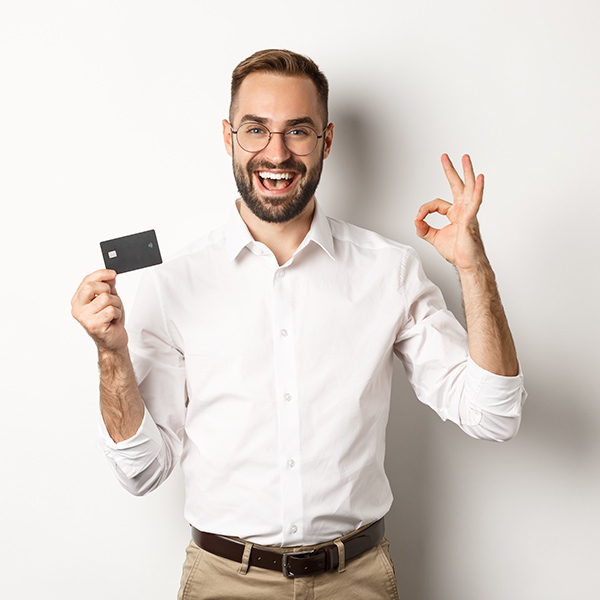 man with credit card in hand